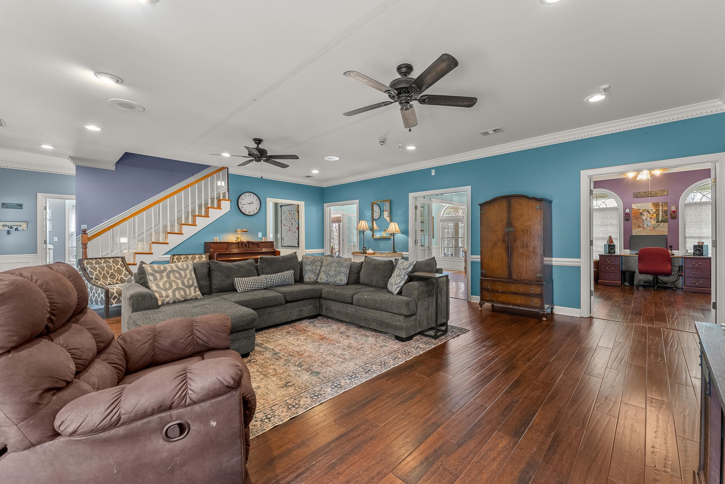 1459 C Vassar Road Pope, MS 38658 - Photo 24 of 40 Living area with visible vents, crown molding, stairs, recessed lighting, and dark wood-style floors