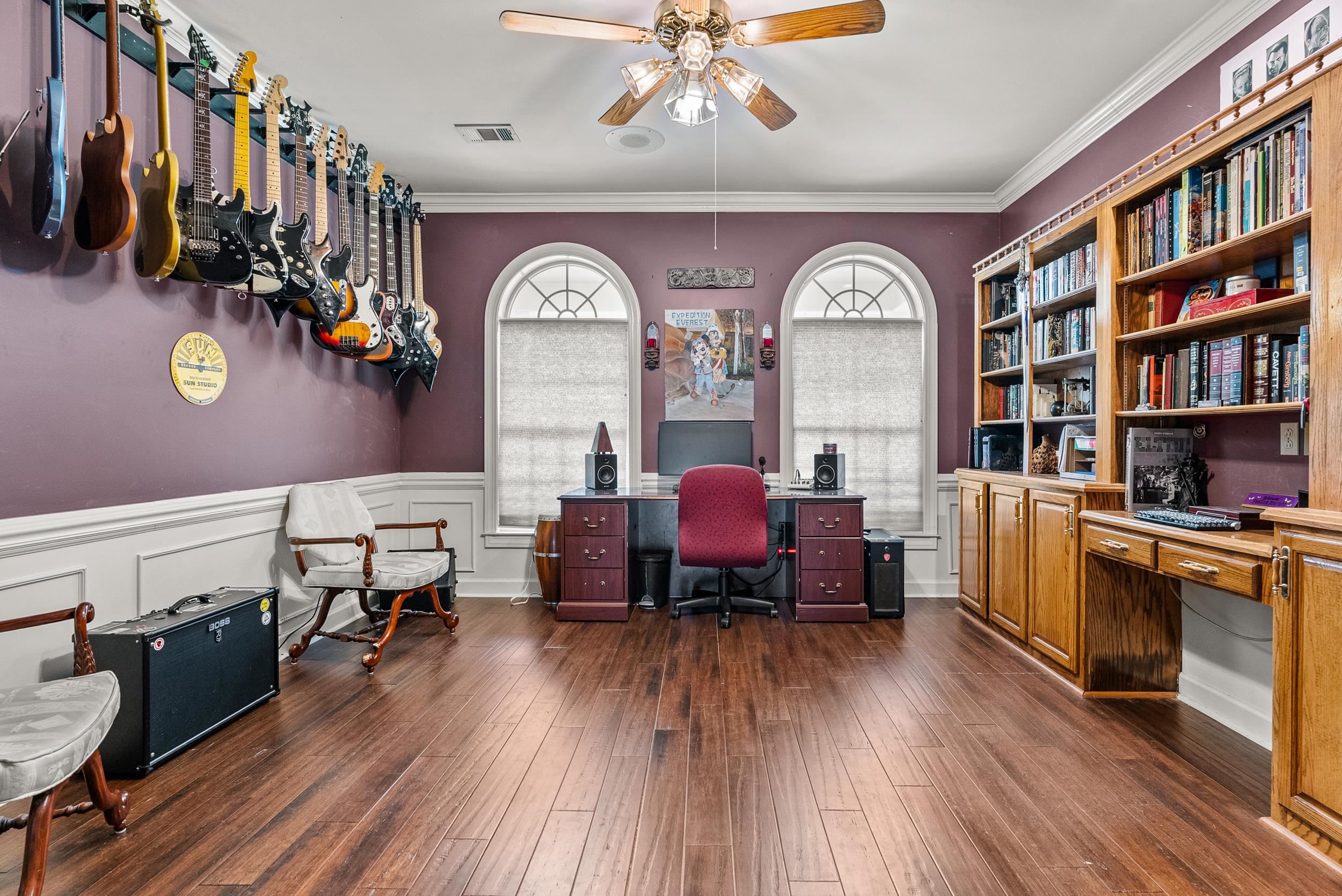 1459 C Vassar Road Pope, MS 38658 - Photo 25 of 40 Office space with visible vents, ceiling fan, ornamental molding, and dark wood-style flooring