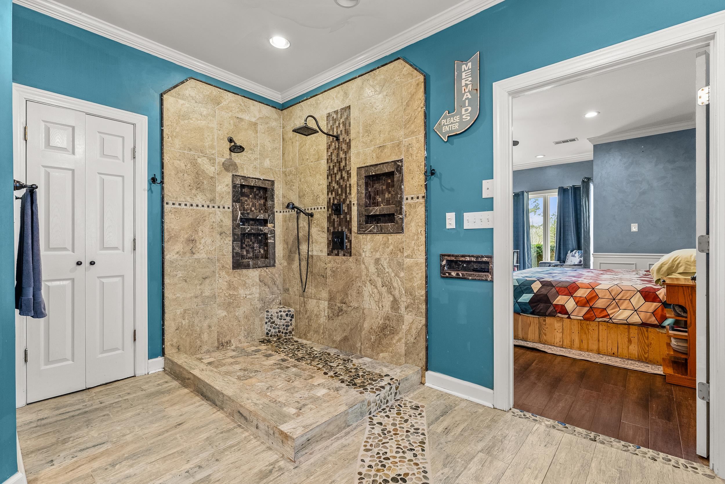 1459 C Vassar Road Pope, MS 38658 - Photo 28 of 40 Ensuite bathroom with ornamental molding, baseboards, ensuite bath, walk in shower, and wood finished floors