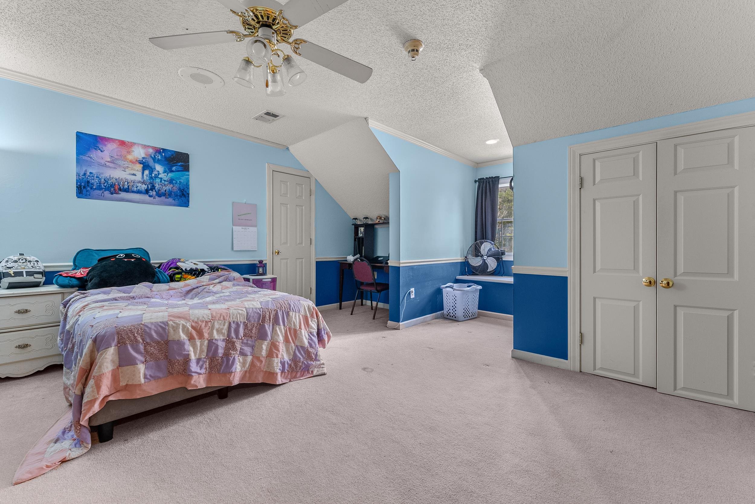 1459 C Vassar Road Pope, MS 38658 - Photo 35 of 40 Carpeted bedroom featuring crown molding, a ceiling fan, a textured ceiling, baseboards, and visible vents
