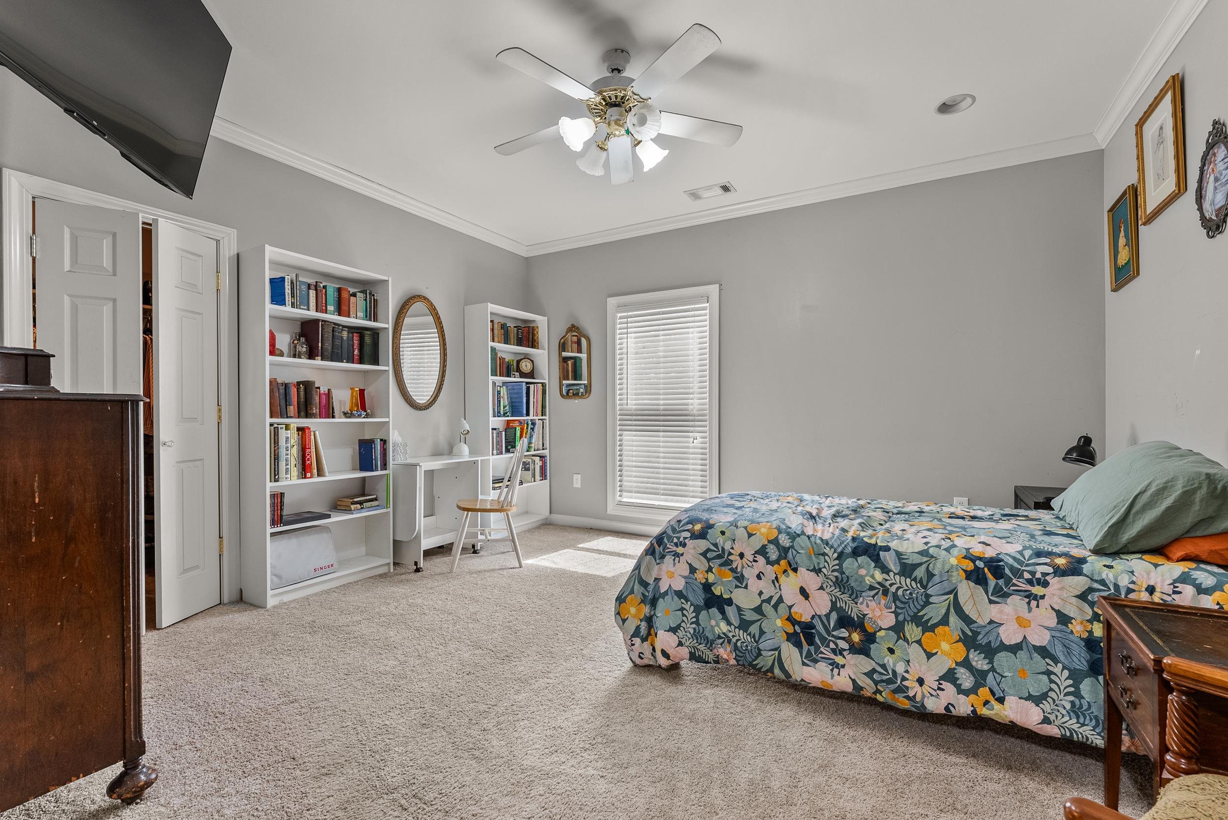 1459 C Vassar Road Pope, MS 38658 - Photo 38 of 40 Bedroom with carpet flooring, baseboards, visible vents, ceiling fan, and ornamental molding
