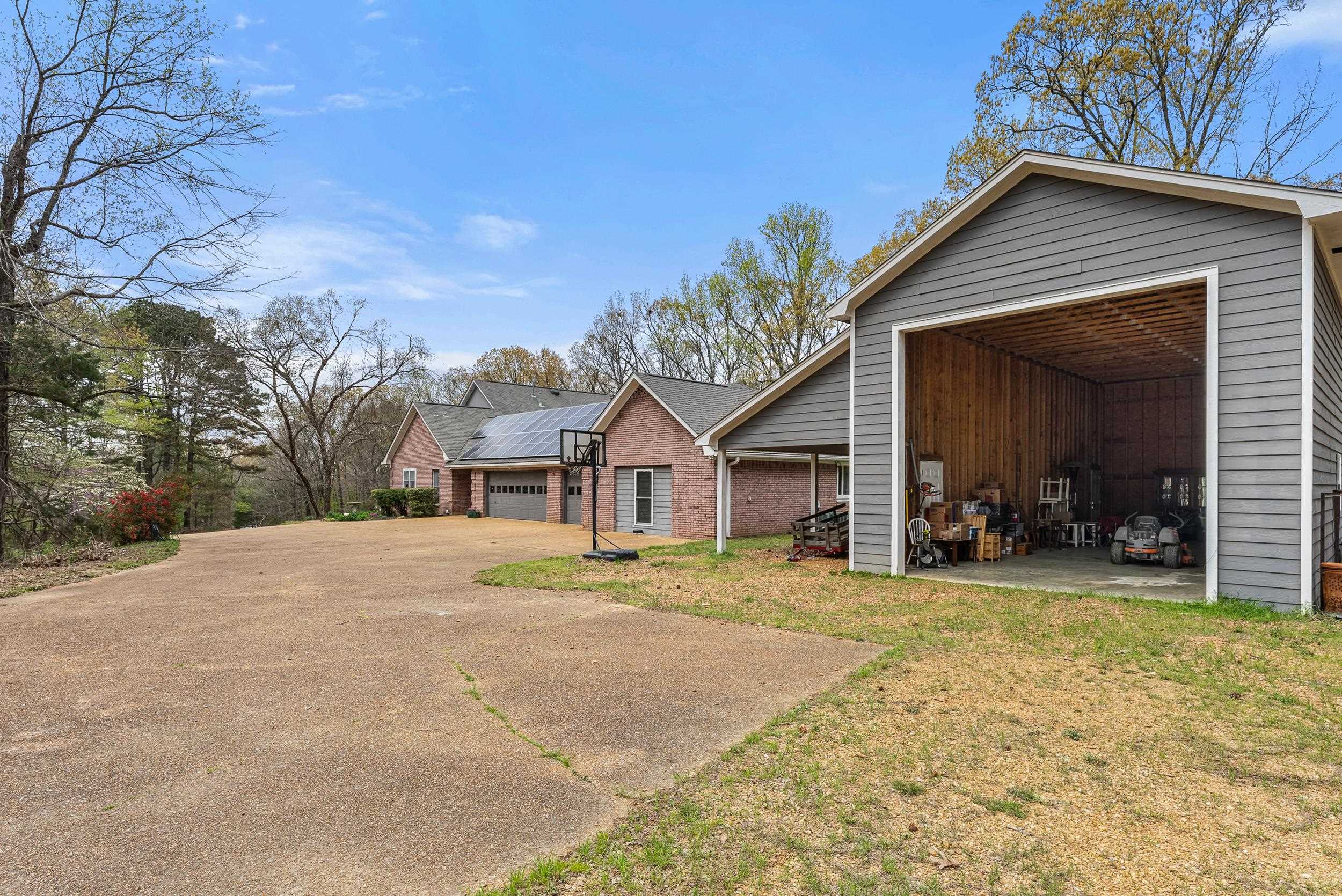 1459 C Vassar Road Pope, MS 38658 - Photo 4 of 40 View of front facade featuring brick siding and a front yard