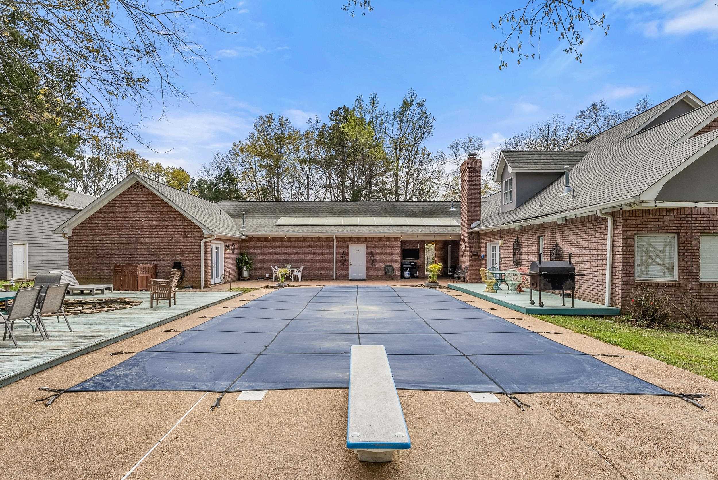 1459 C Vassar Road Pope, MS 38658 - Photo 8 of 40 View of pool featuring an outdoor fire pit, grilling area, and a patio