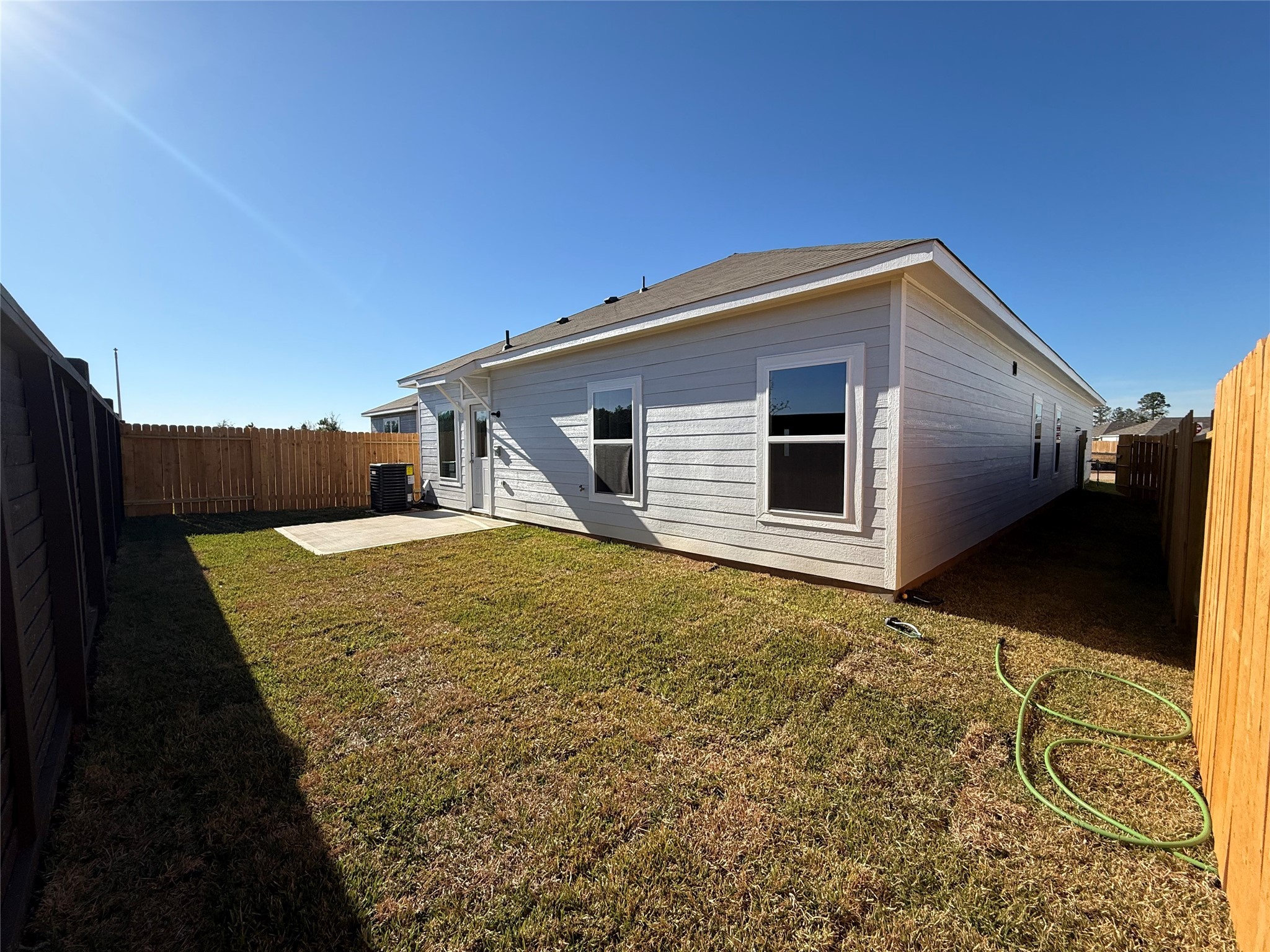 15806 Berry Hl Drive Conroe, TX 77303 - Photo 2 of 25 a backyard of a house