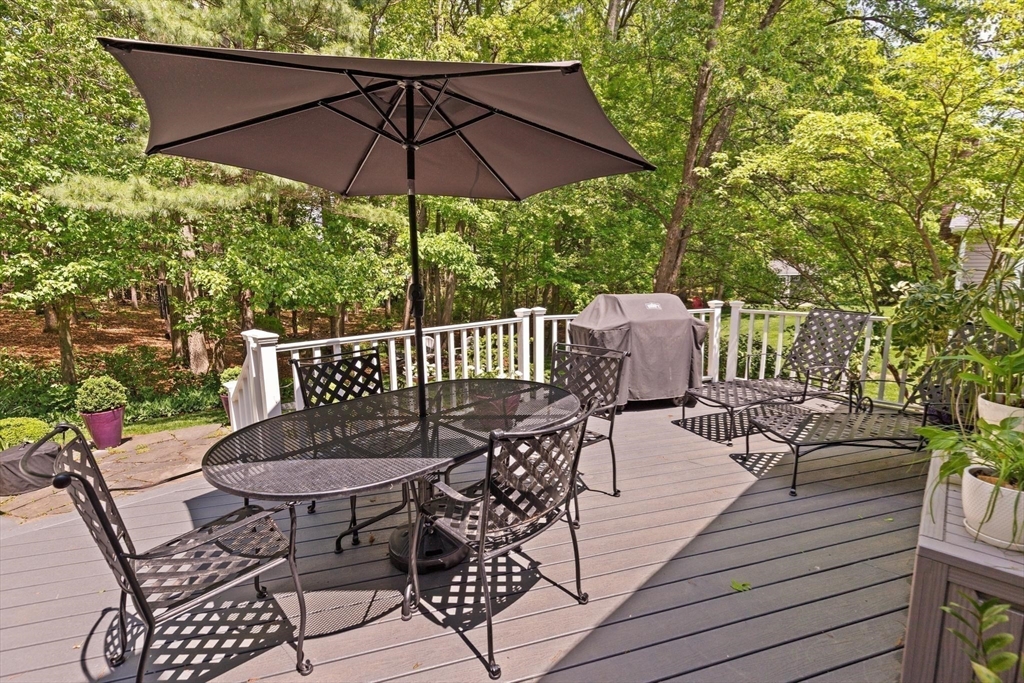67 Bridle Path Franklin, MA 02038 - Photo 29 of 35 a view of balcony with furniture and umbrella