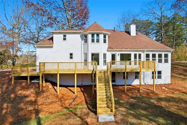 a view of a large building next to a yard