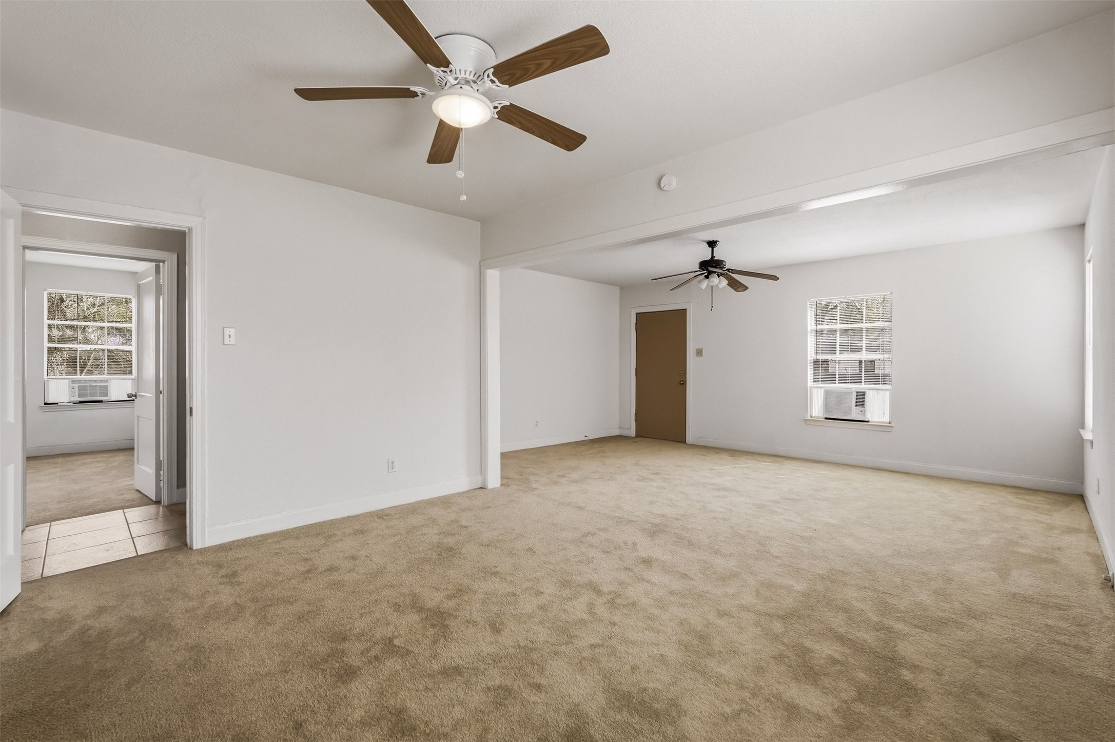 7215 Apache Street Houston, TX 77028 - Photo 12 of 20 en view interior of a house and a ceiling fan