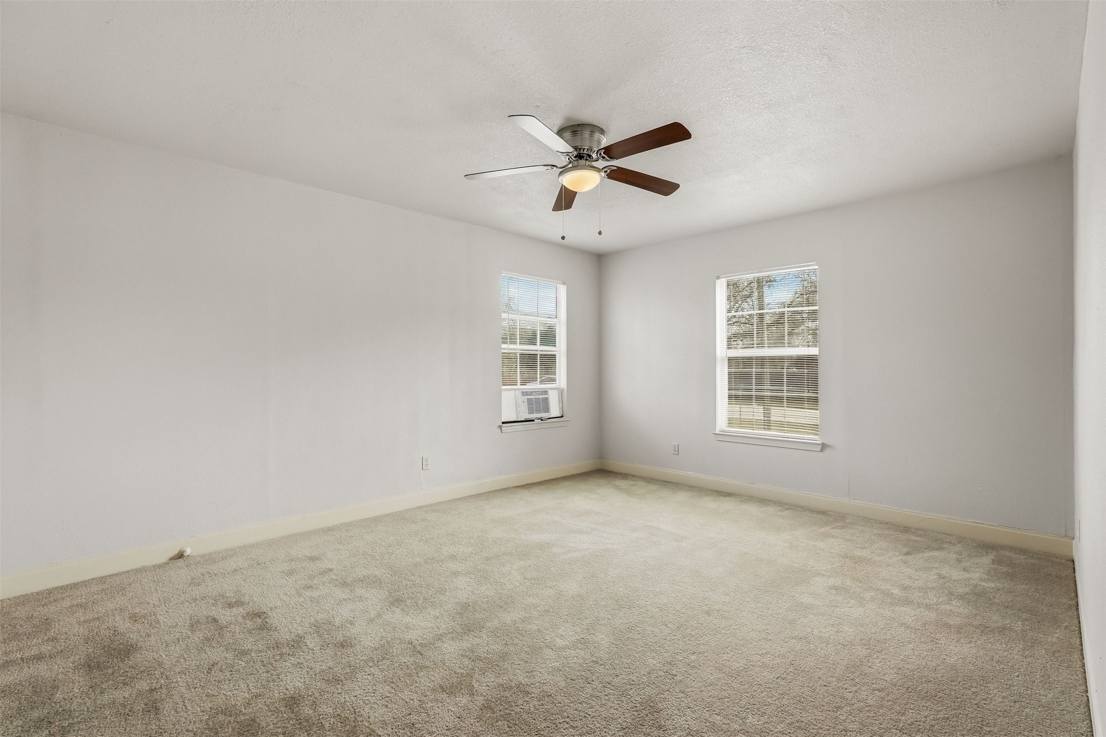 7215 Apache Street Houston, TX 77028 - Photo 15 of 20 a view of an empty room with a window