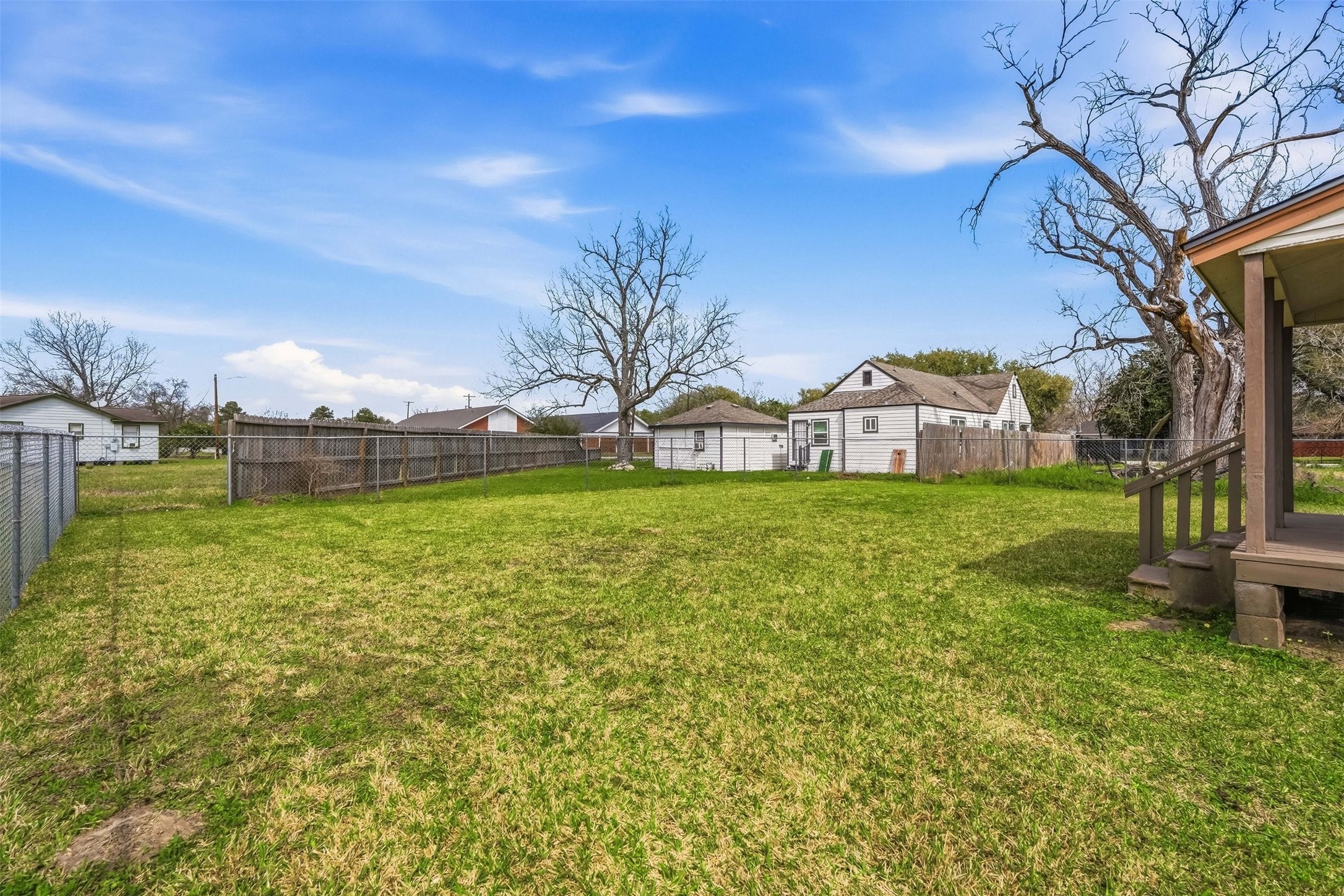 7215 Apache Street Houston, TX 77028 - Photo 18 of 20 a view of a house with a big yard