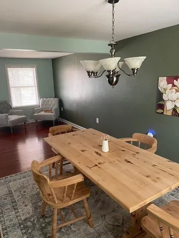 a view of a workspace with furniture