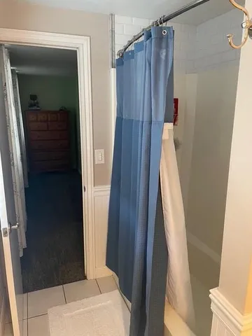 a bathroom with a sink and toilet