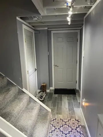 a view of a room with a rug