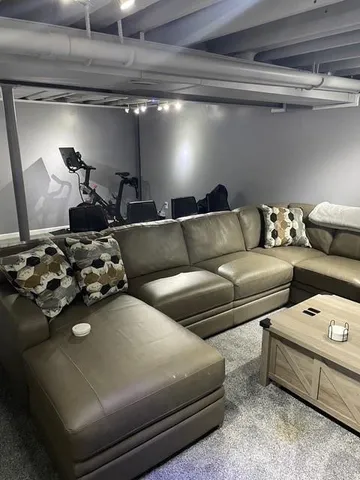 a living room with furniture and a couch
