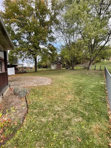 a view of a yard with a trees