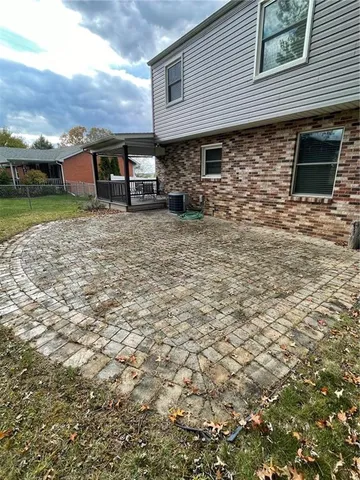 a front view of a house with garage