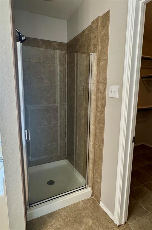 204 South Chestnut Street Forney, TX 75126 - Photo 11 of 19 a bathroom with a shower and a sink