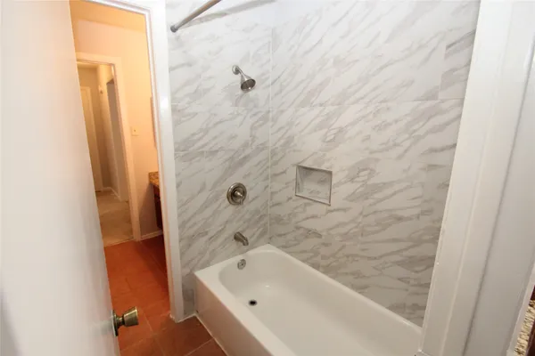 a bathroom with a bathtub