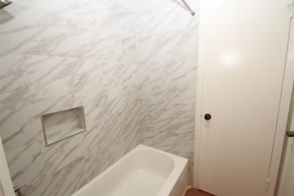 a bathroom with a bathtub