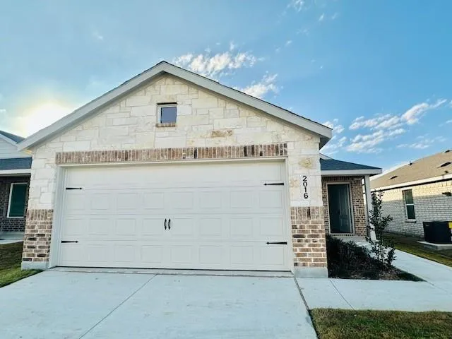 a view of a house with garage