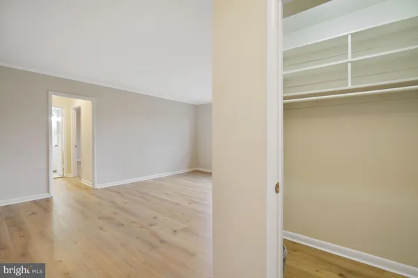 a view of an empty room with empty racks