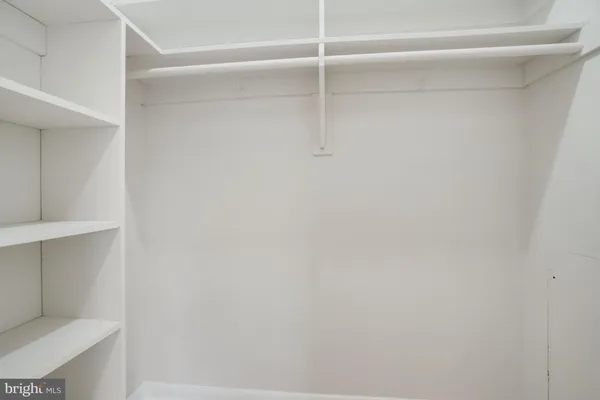 a bathroom with a shower and a toilet