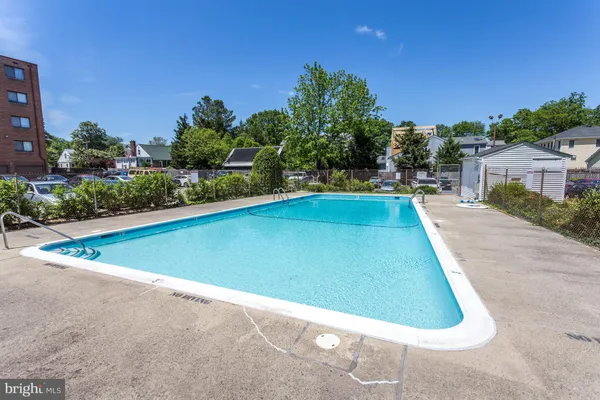 a view of outdoor space and swimming pool