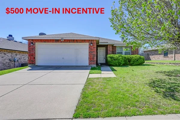 a bedroom with furniture and a fireplace