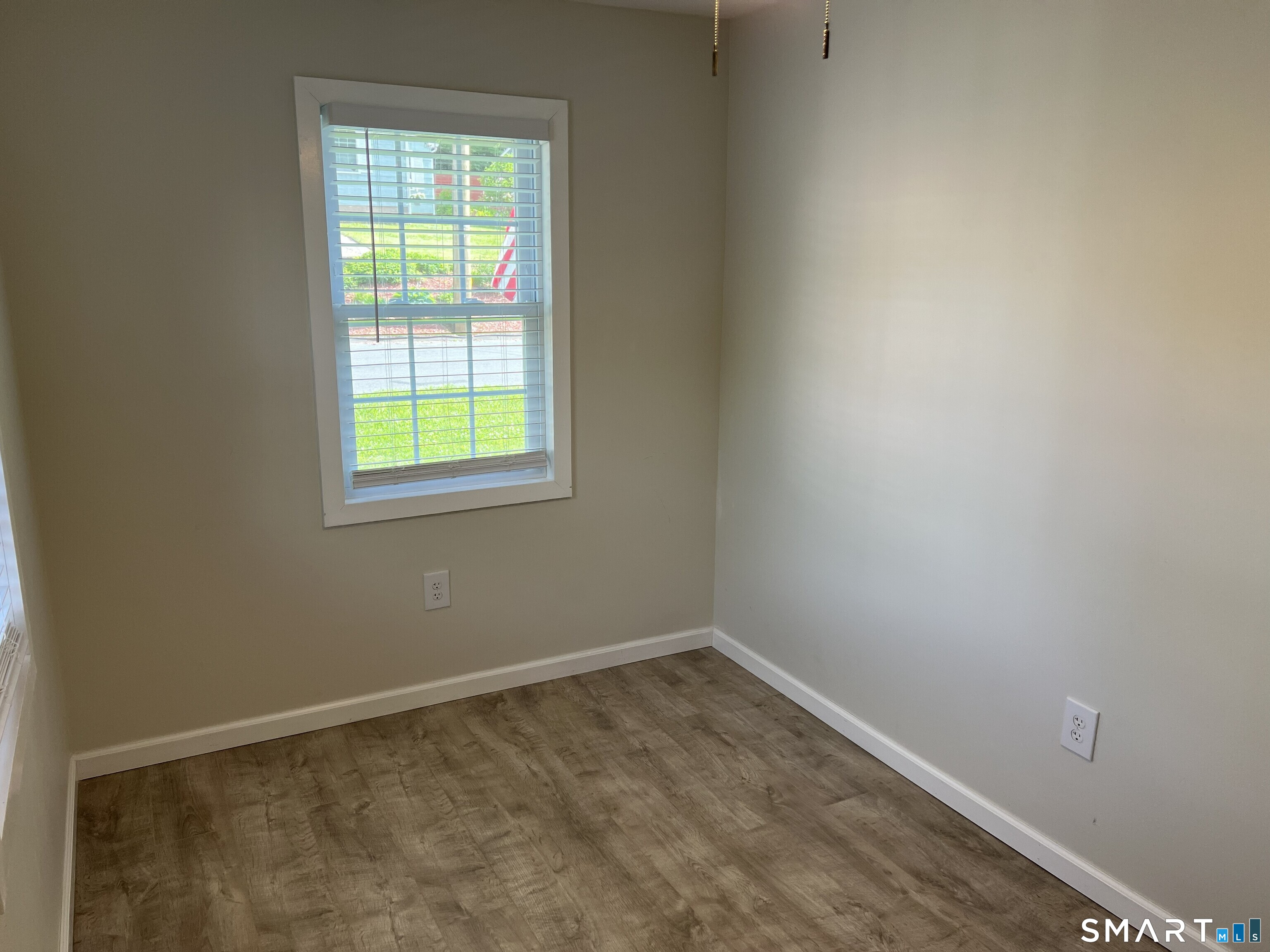 82 Bingham Street Bristol, CT 06010 - Photo 27 of 40 an empty room with a window