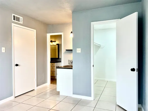 a view of a storage & utility room in a house