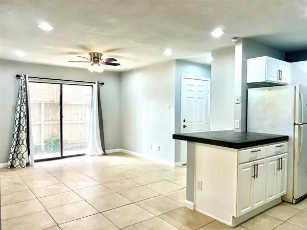 a bathroom with a sink a mirror and a vanity