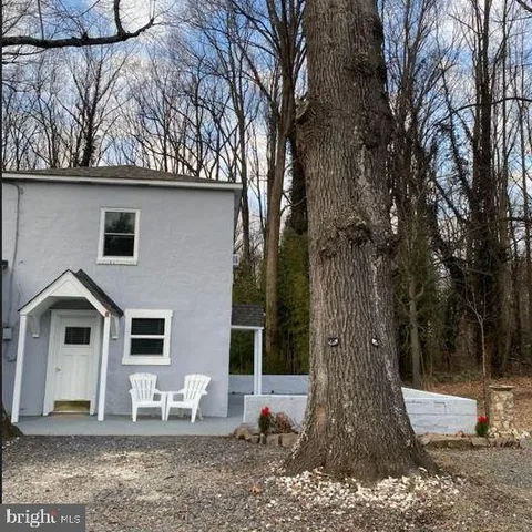 a house view with a outdoor space