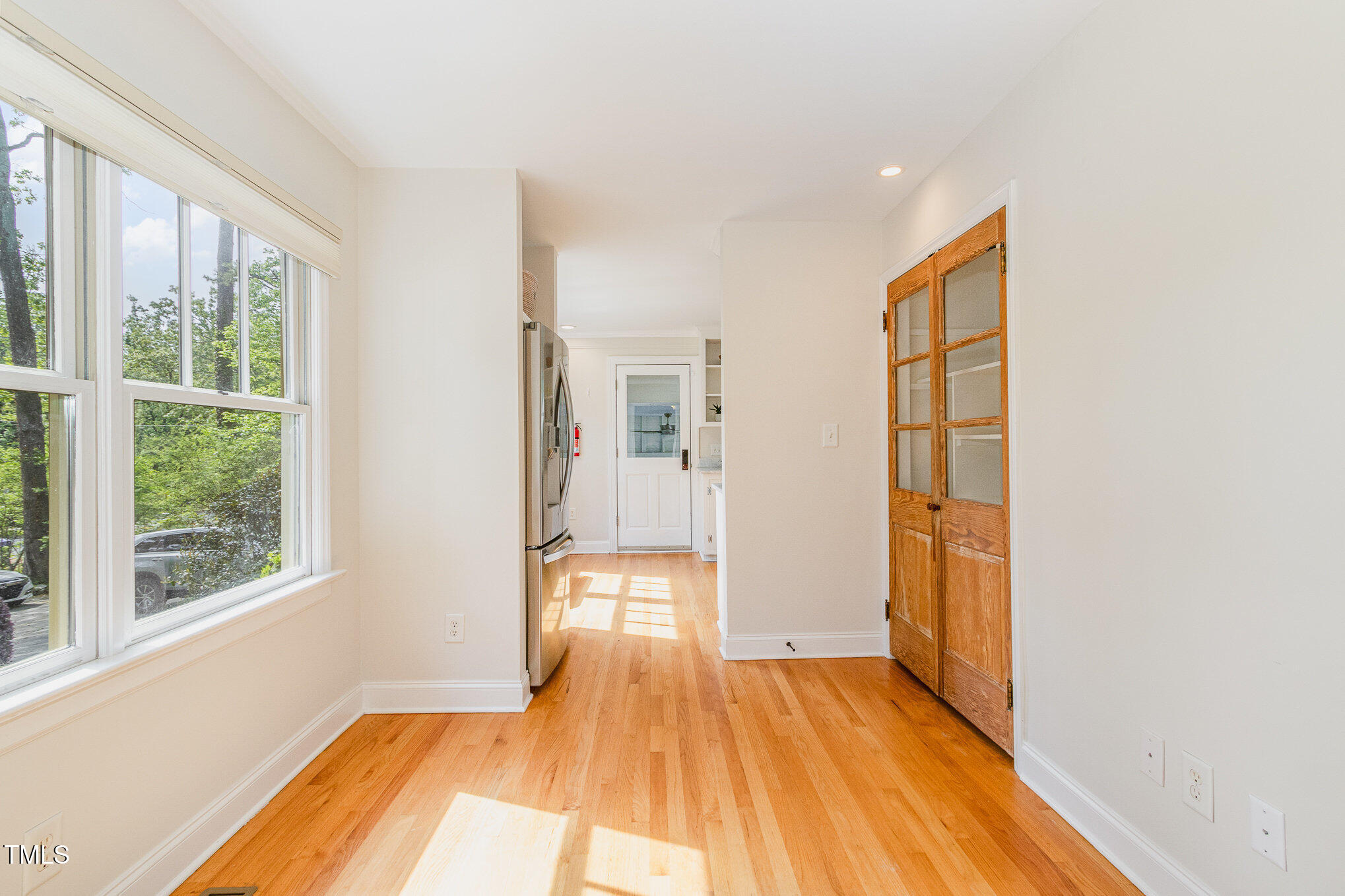 804 Old Mill Road Chapel Hill, NC 27514 - Photo 11 of 30 a view of a room with wooden floor and a window