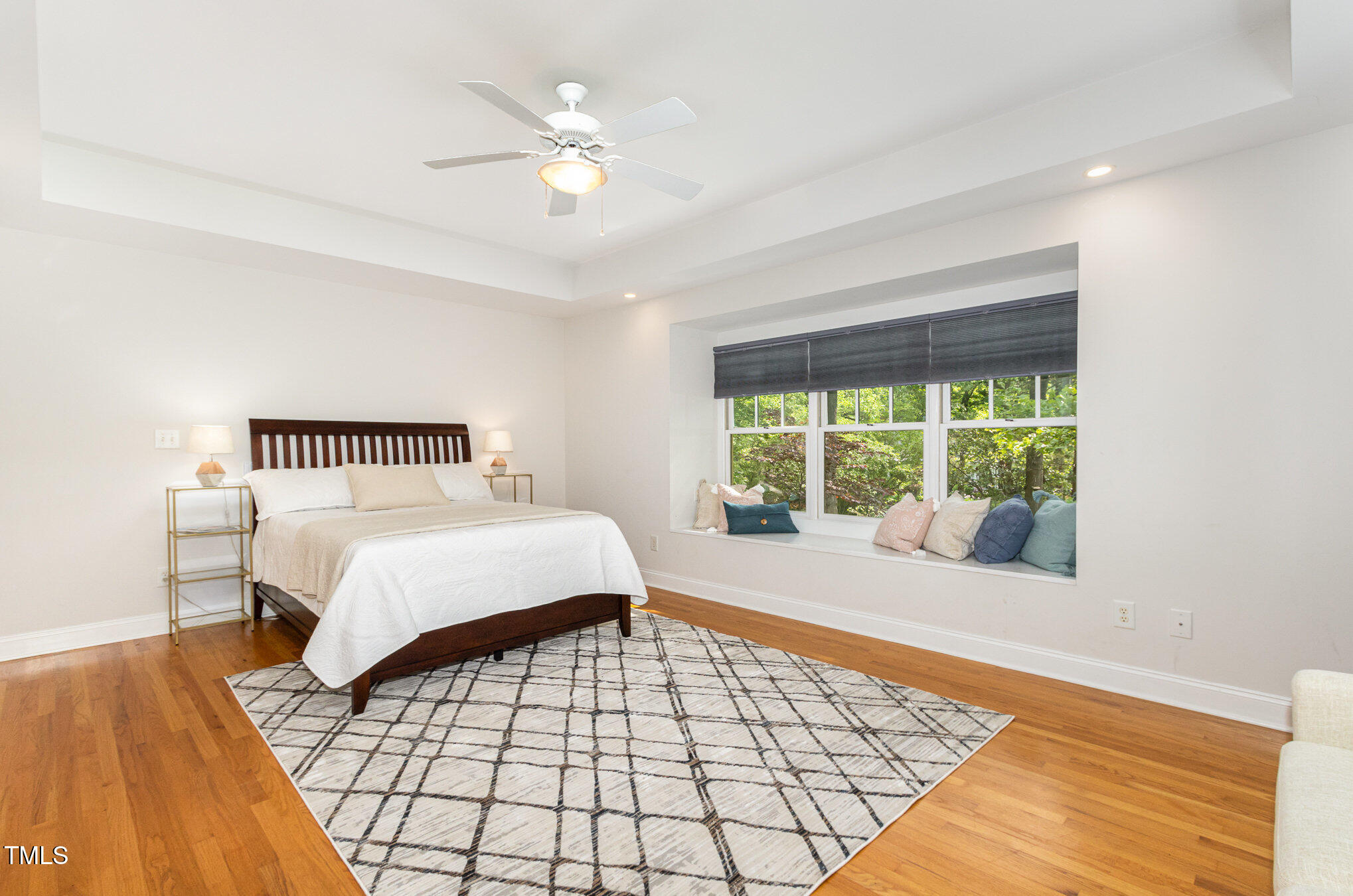 804 Old Mill Road Chapel Hill, NC 27514 - Photo 12 of 30 a bedroom with a bed and a large window