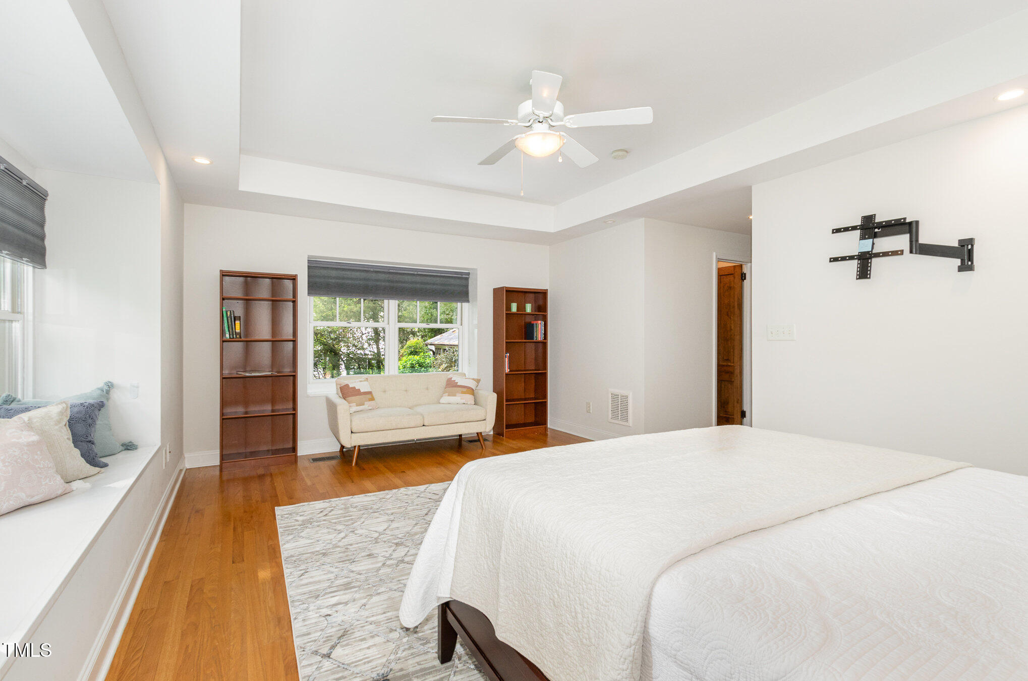 804 Old Mill Road Chapel Hill, NC 27514 - Photo 13 of 30 a bedroom with a large bed and a couch