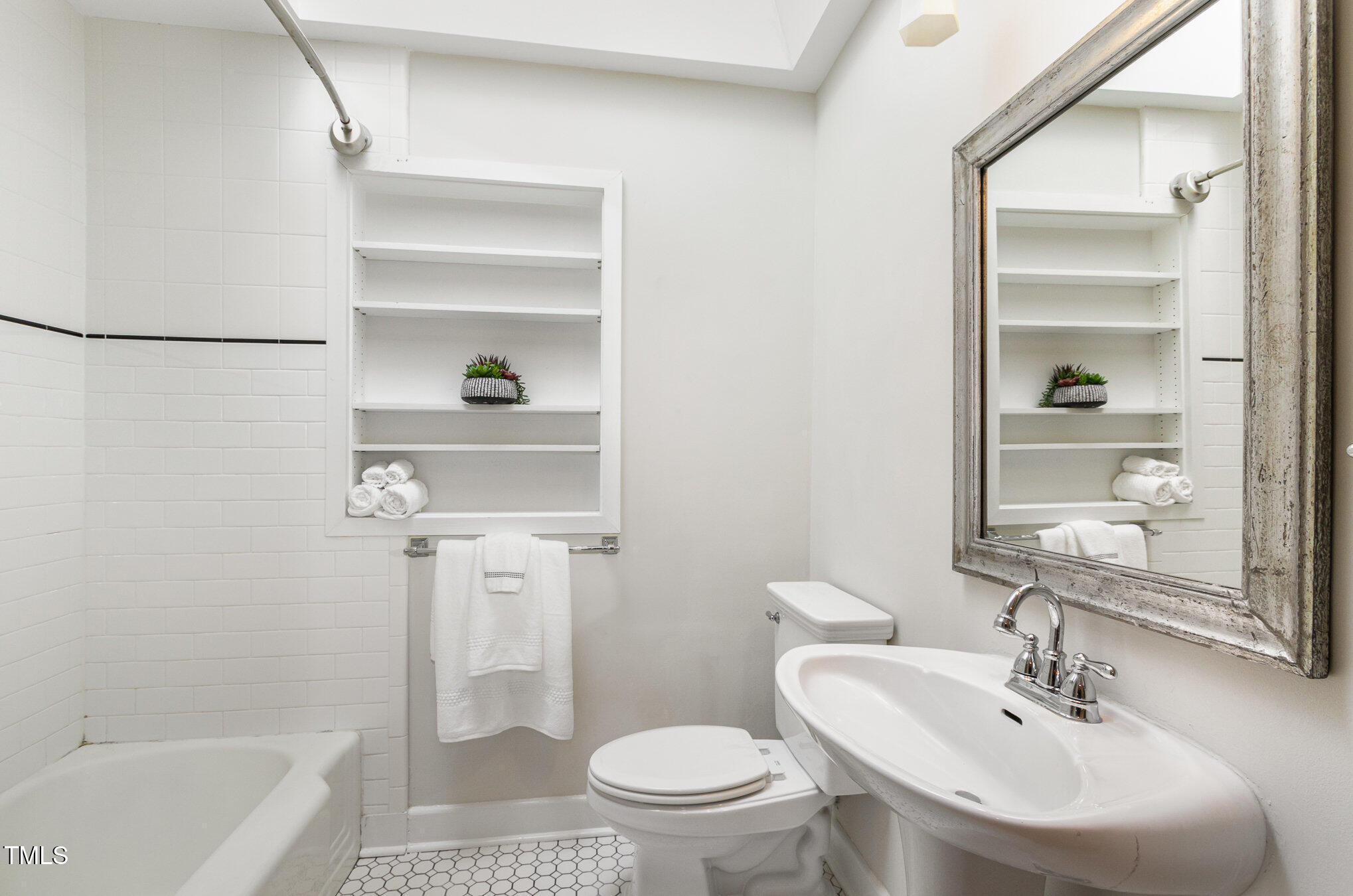 804 Old Mill Road Chapel Hill, NC 27514 - Photo 19 of 30 a bathroom with a sink a toilet and shower
