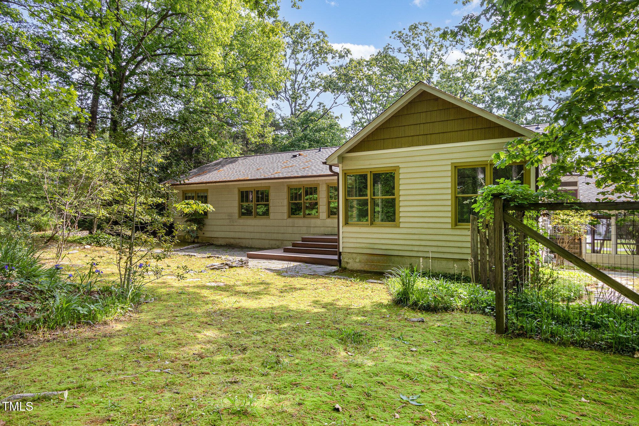 804 Old Mill Road Chapel Hill, NC 27514 - Photo 25 of 30 a front view of a house with a yard and trees