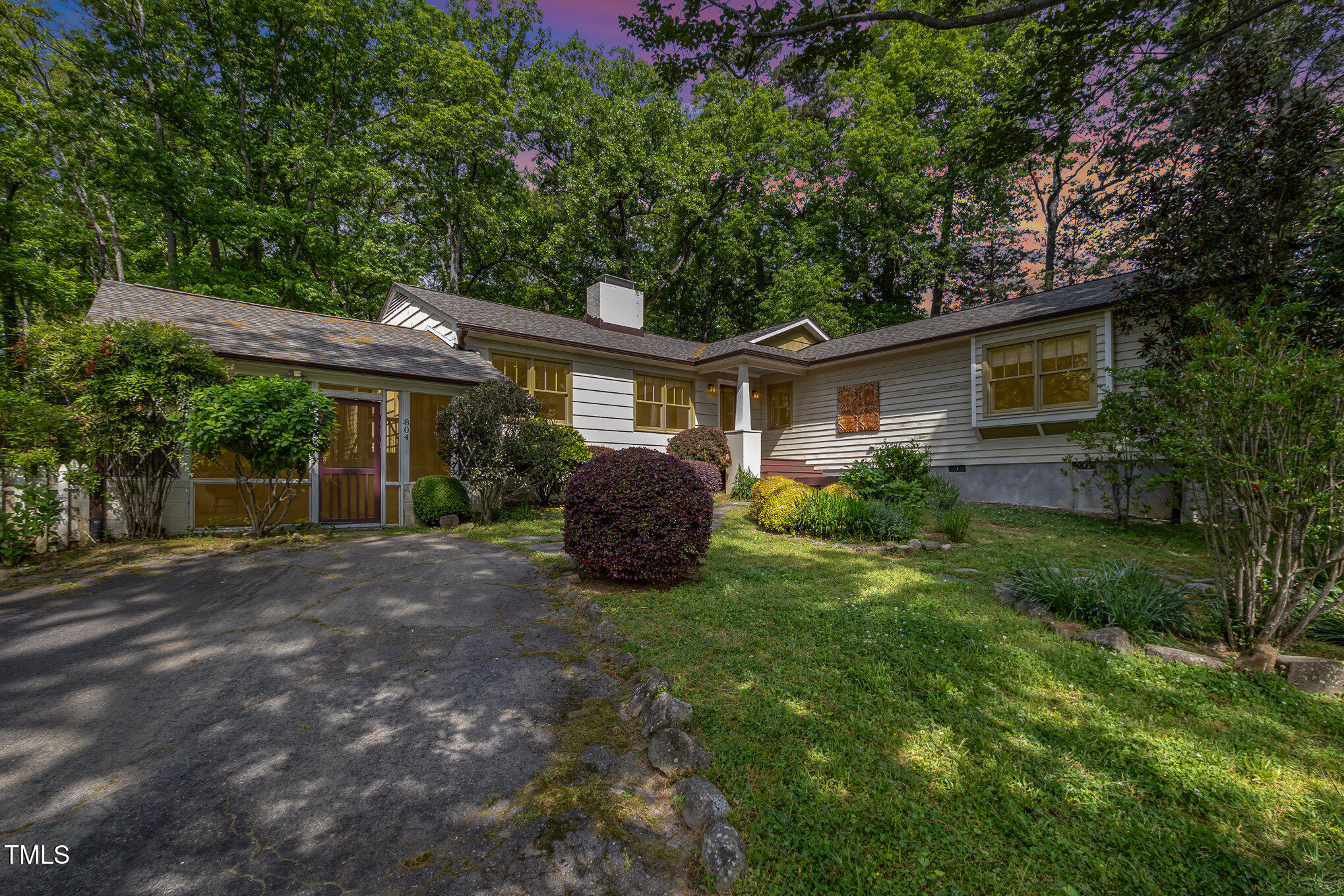 804 Old Mill Road Chapel Hill, NC 27514 - Photo 26 of 30 a view of a house with backyard and garden