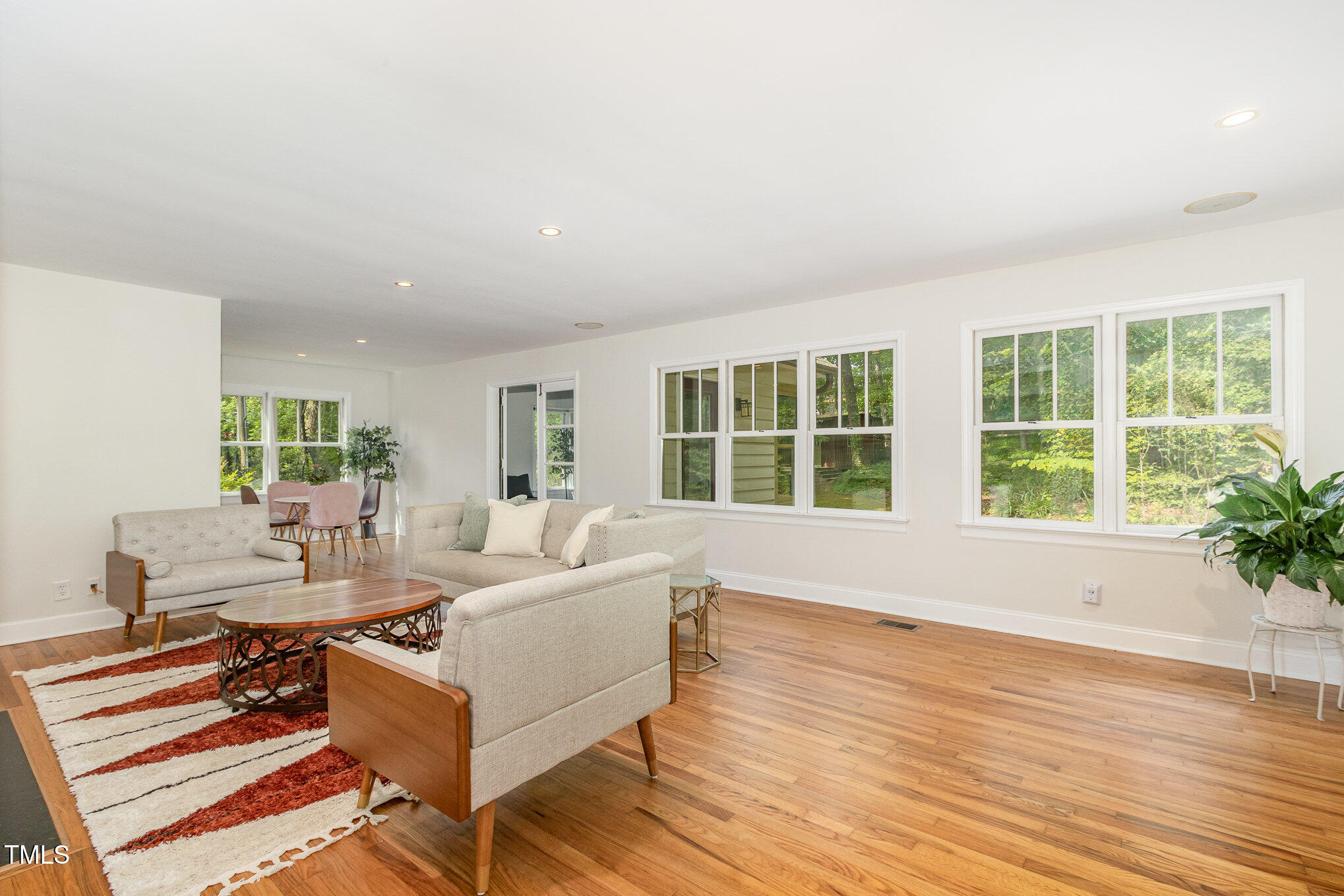 804 Old Mill Road Chapel Hill, NC 27514 - Photo 4 of 30 a living room with furniture and a large window