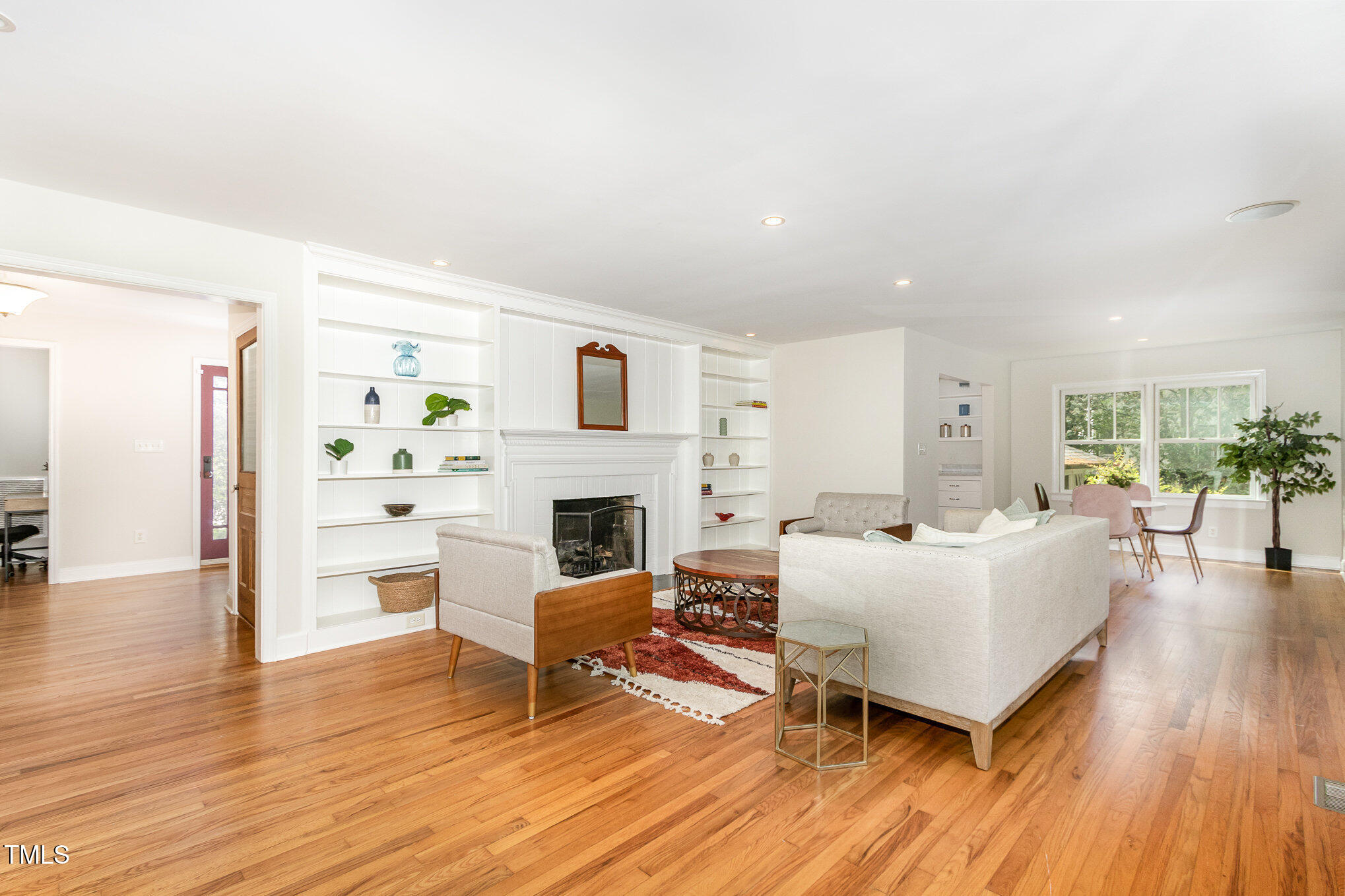 804 Old Mill Road Chapel Hill, NC 27514 - Photo 5 of 30 a living room with furniture and a fireplace