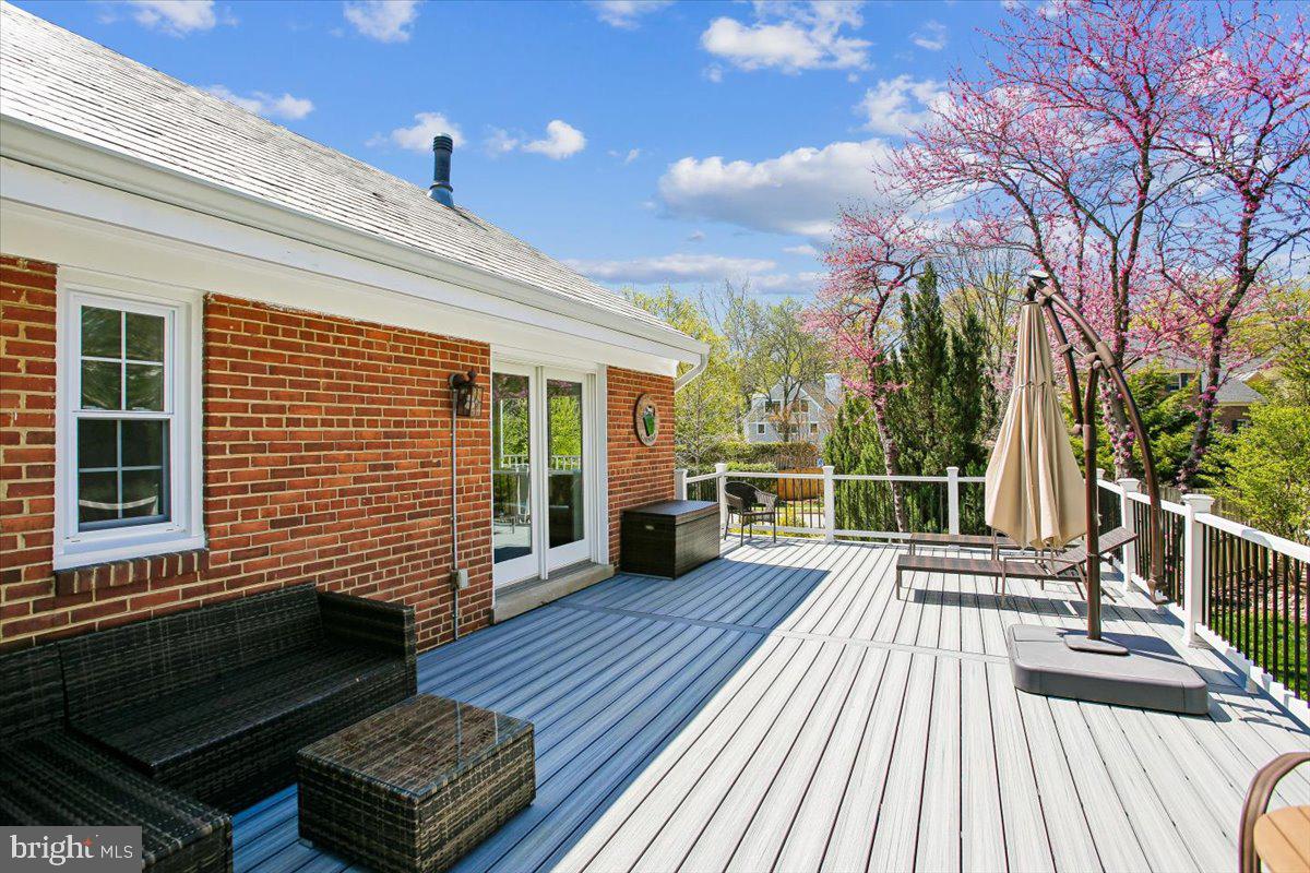 1305 Key Drive Alexandria, VA 22302 - Photo 38 of 64 a view of a roof deck with wooden floor and fence