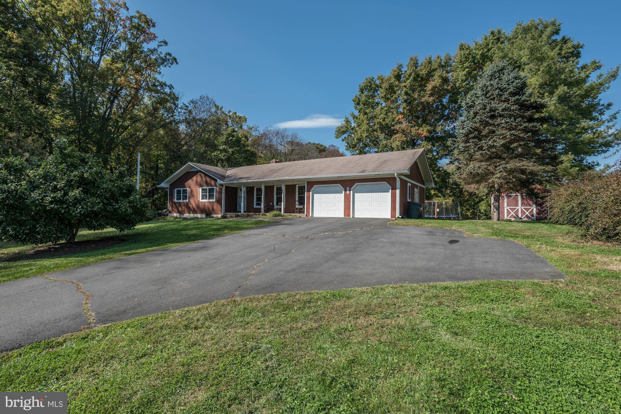 16869 Ivandale Road Hamilton, VA 20158 - Photo 1 of 21 a front view of a house with a yard