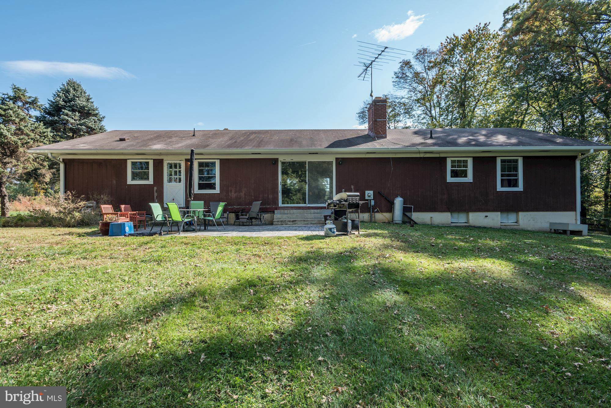 16869 Ivandale Road Hamilton, VA 20158 - Photo 18 of 21 a front view of house with yard and outdoor seating