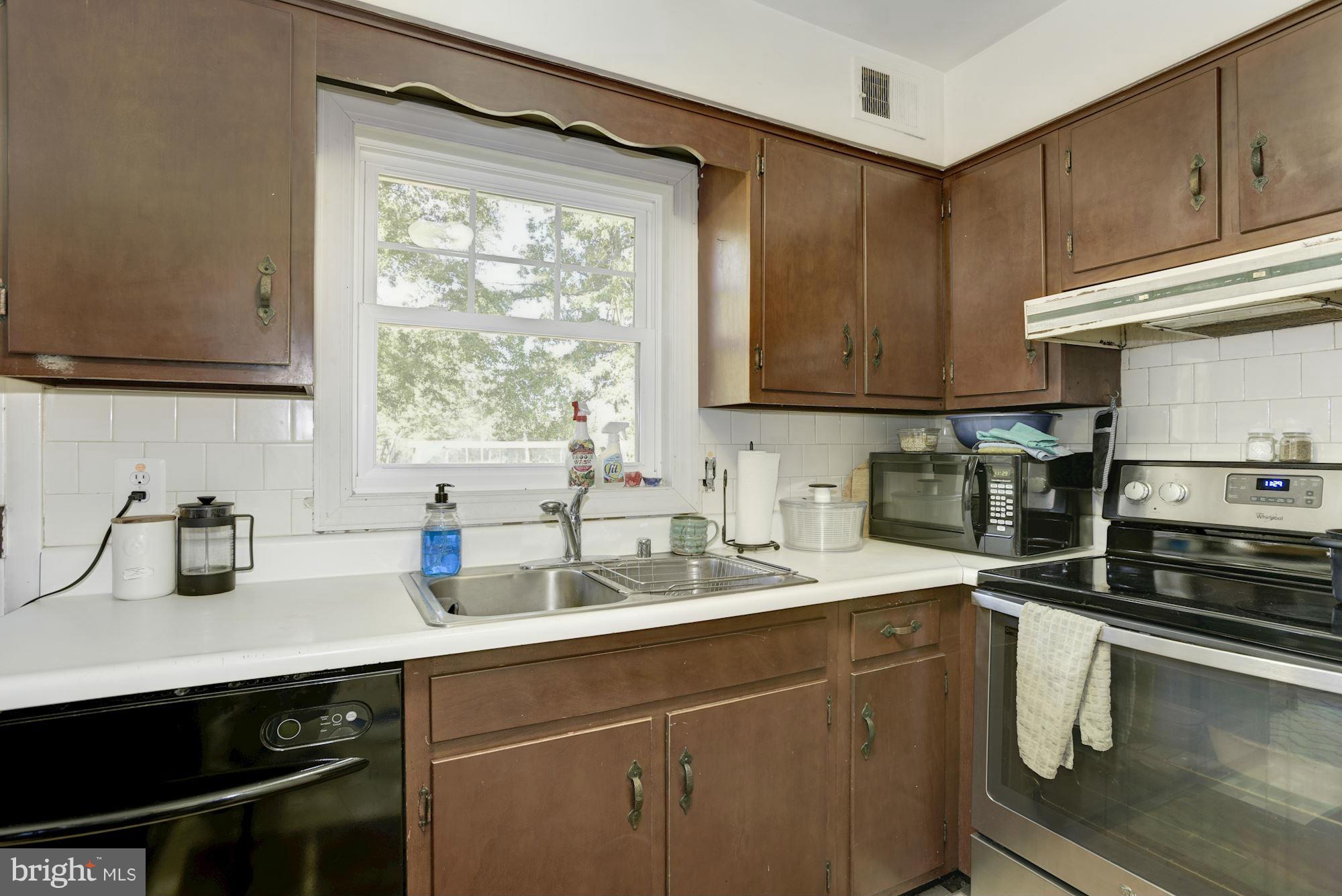 16869 Ivandale Road Hamilton, VA 20158 - Photo 7 of 21 a kitchen with a sink and a window