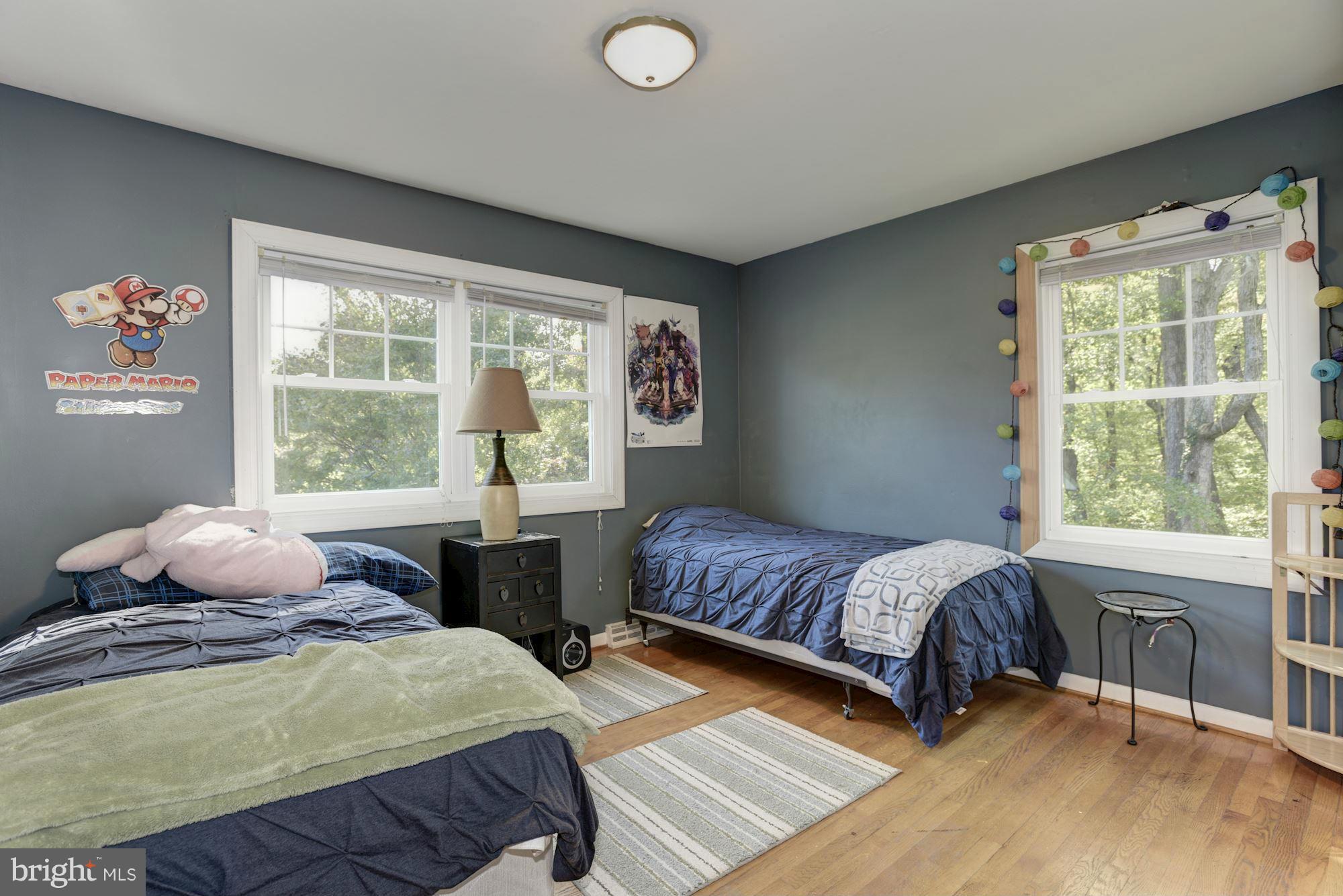 16869 Ivandale Road Hamilton, VA 20158 - Photo 10 of 21 a bedroom with a bed and wooden floor