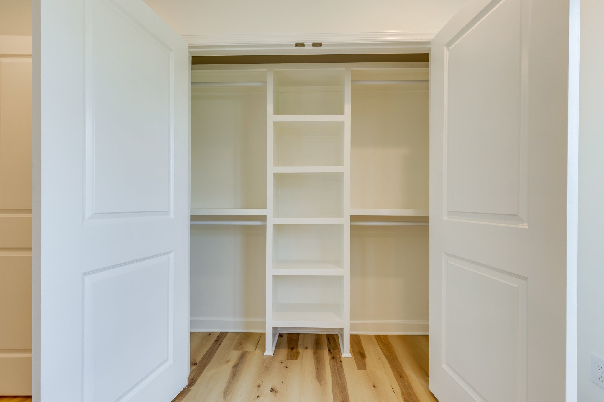309 Pisgah Rdg Cove Pulaski, TN 38478 - Photo 21 of 43 a view of walk in closet with empty racks