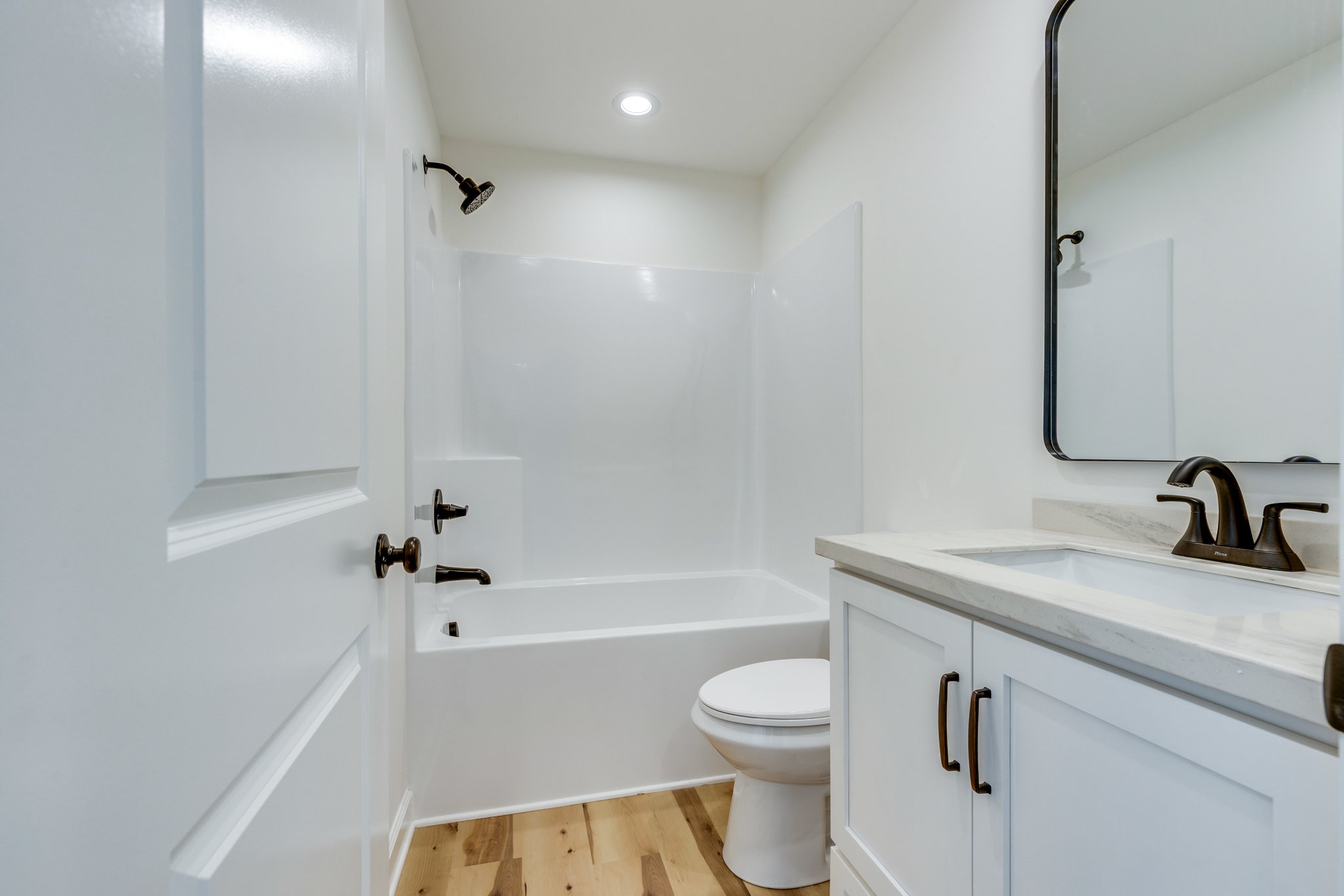 309 Pisgah Rdg Cove Pulaski, TN 38478 - Photo 25 of 43 a bathroom with a sink a toilet and a bathtub