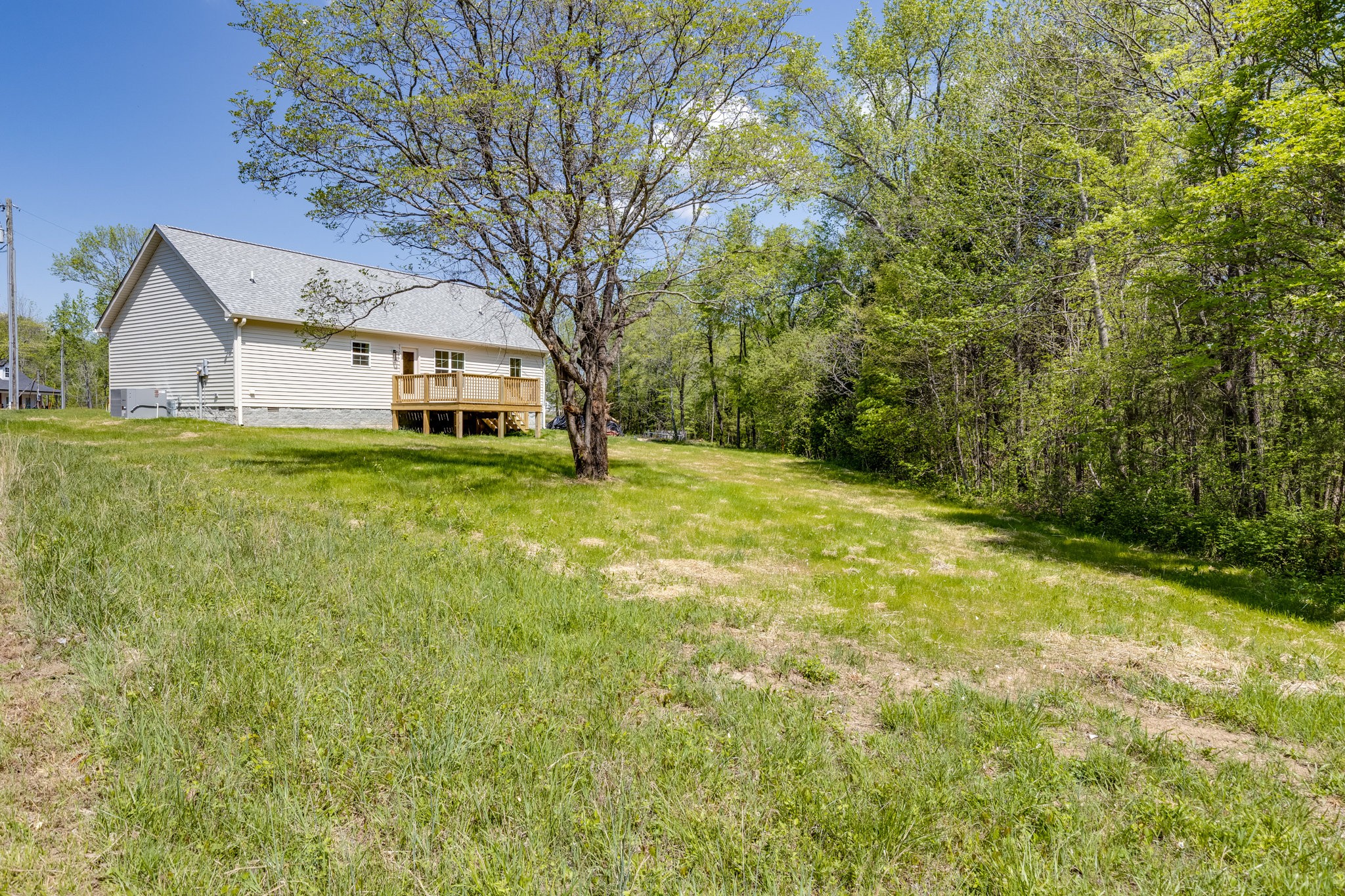 309 Pisgah Rdg Cove Pulaski, TN 38478 - Photo 30 of 43 a view of a house with a yard