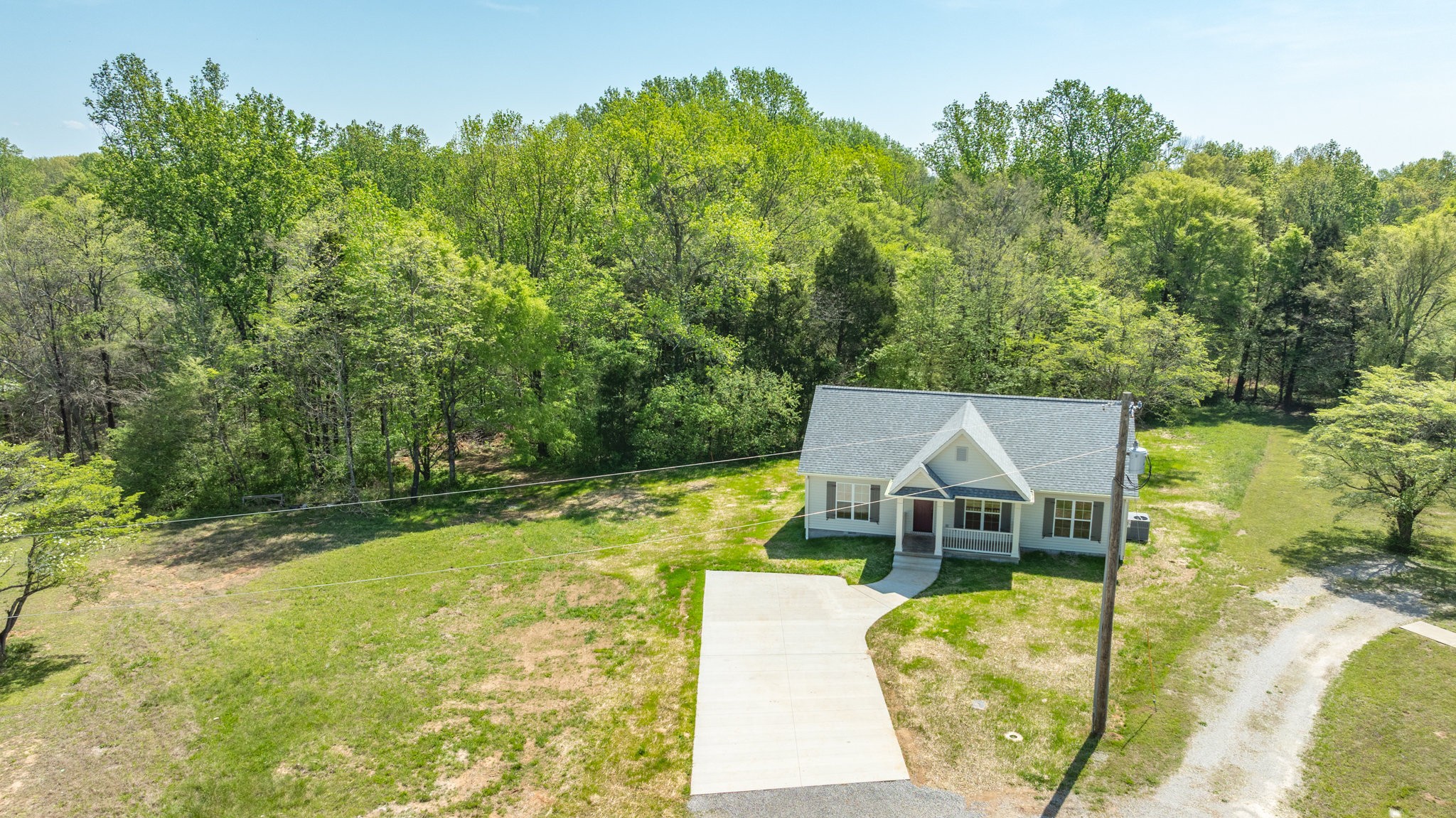 309 Pisgah Rdg Cove Pulaski, TN 38478 - Photo 35 of 43 an aerial view of a house with swimming pool garden and patio