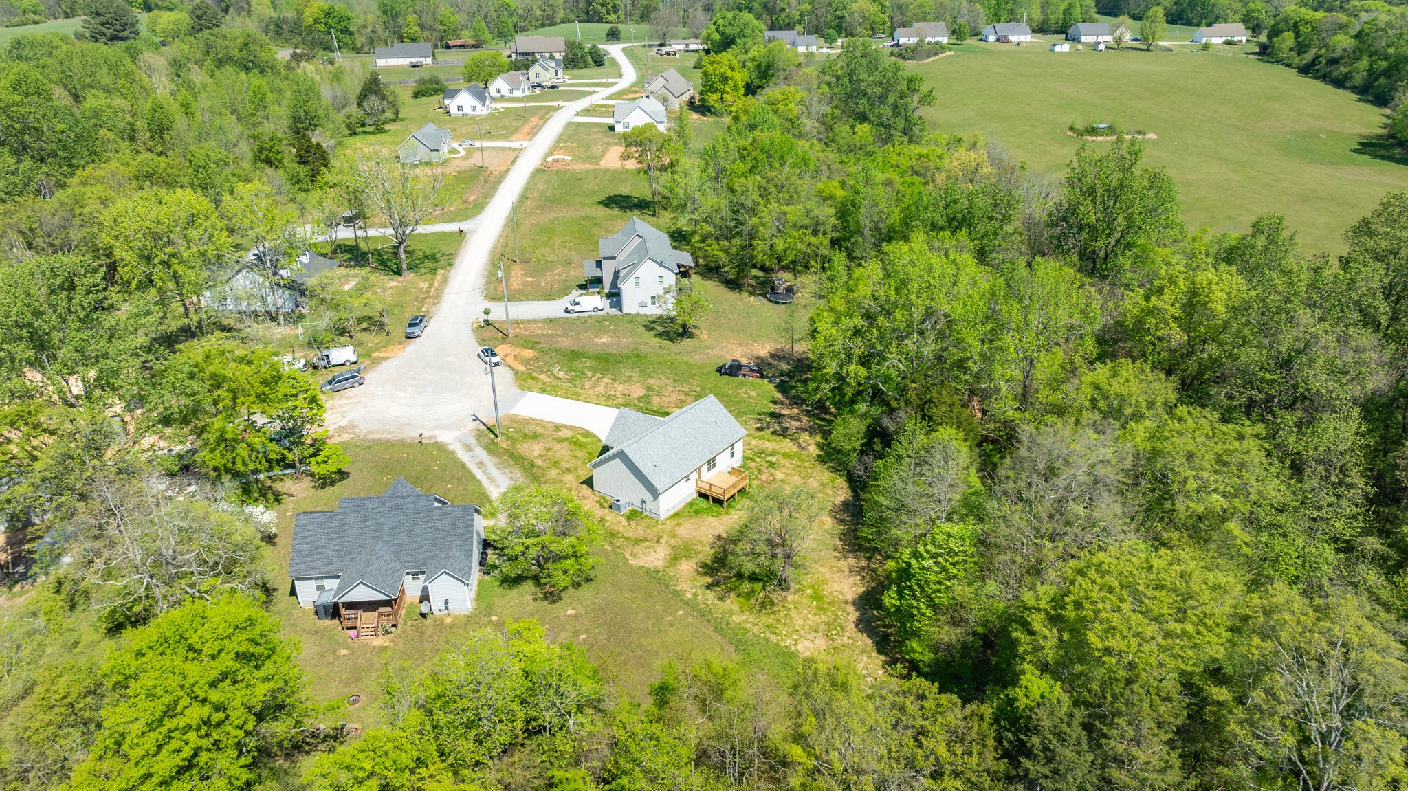 309 Pisgah Rdg Cove Pulaski, TN 38478 - Photo 38 of 43 an aerial view of residential house with pool and yard
