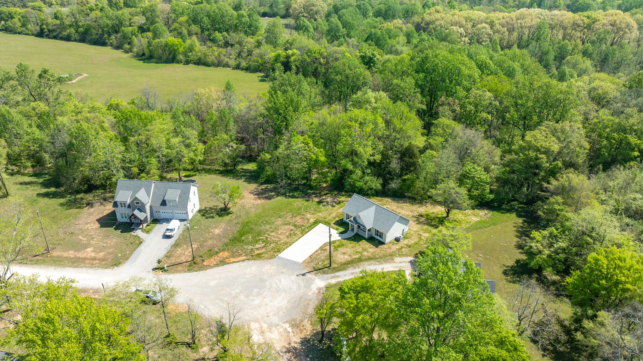 309 Pisgah Rdg Cove Pulaski, TN 38478 - Photo 40 of 43 a view of a houses with yard and lake